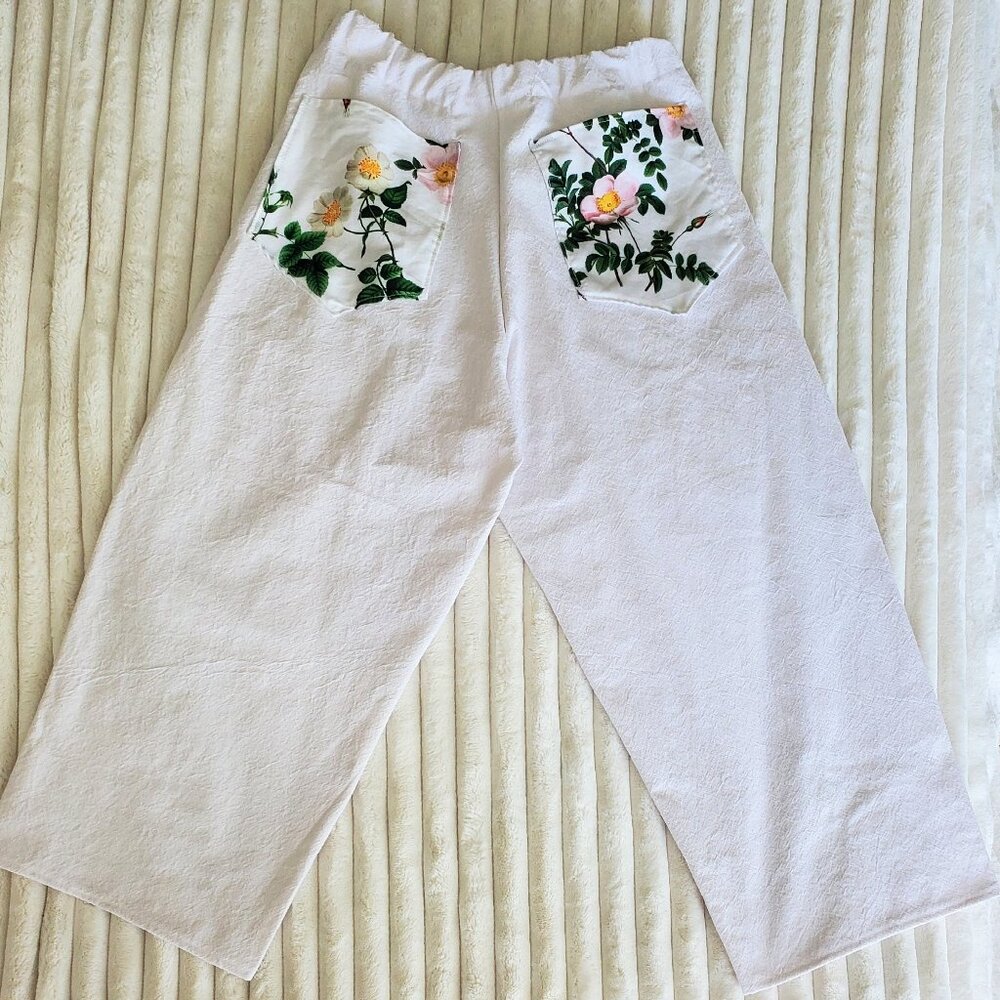 Handmade cotton pants with floral accent pockets